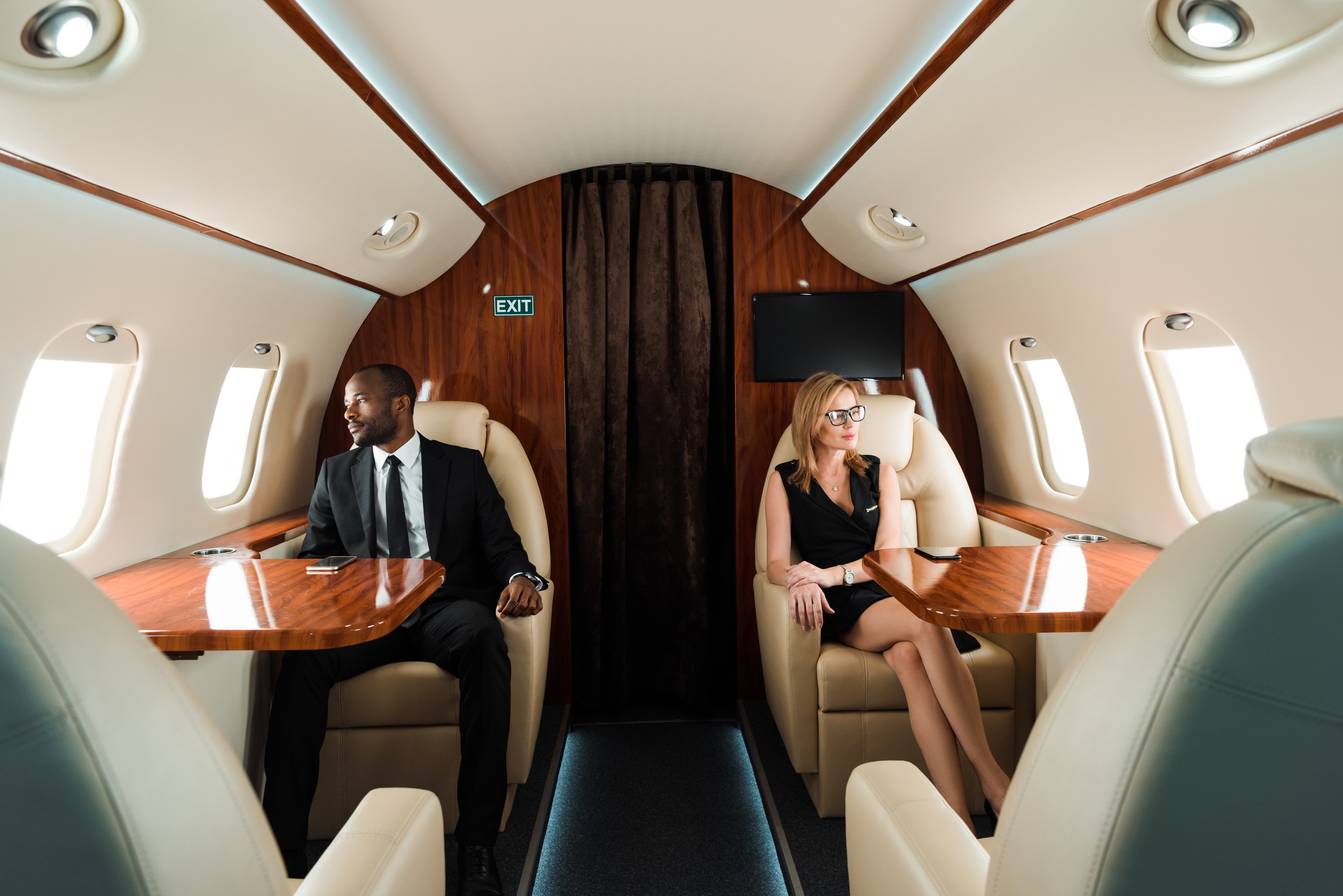 Two investors flying together i their fractionally owned private jet.